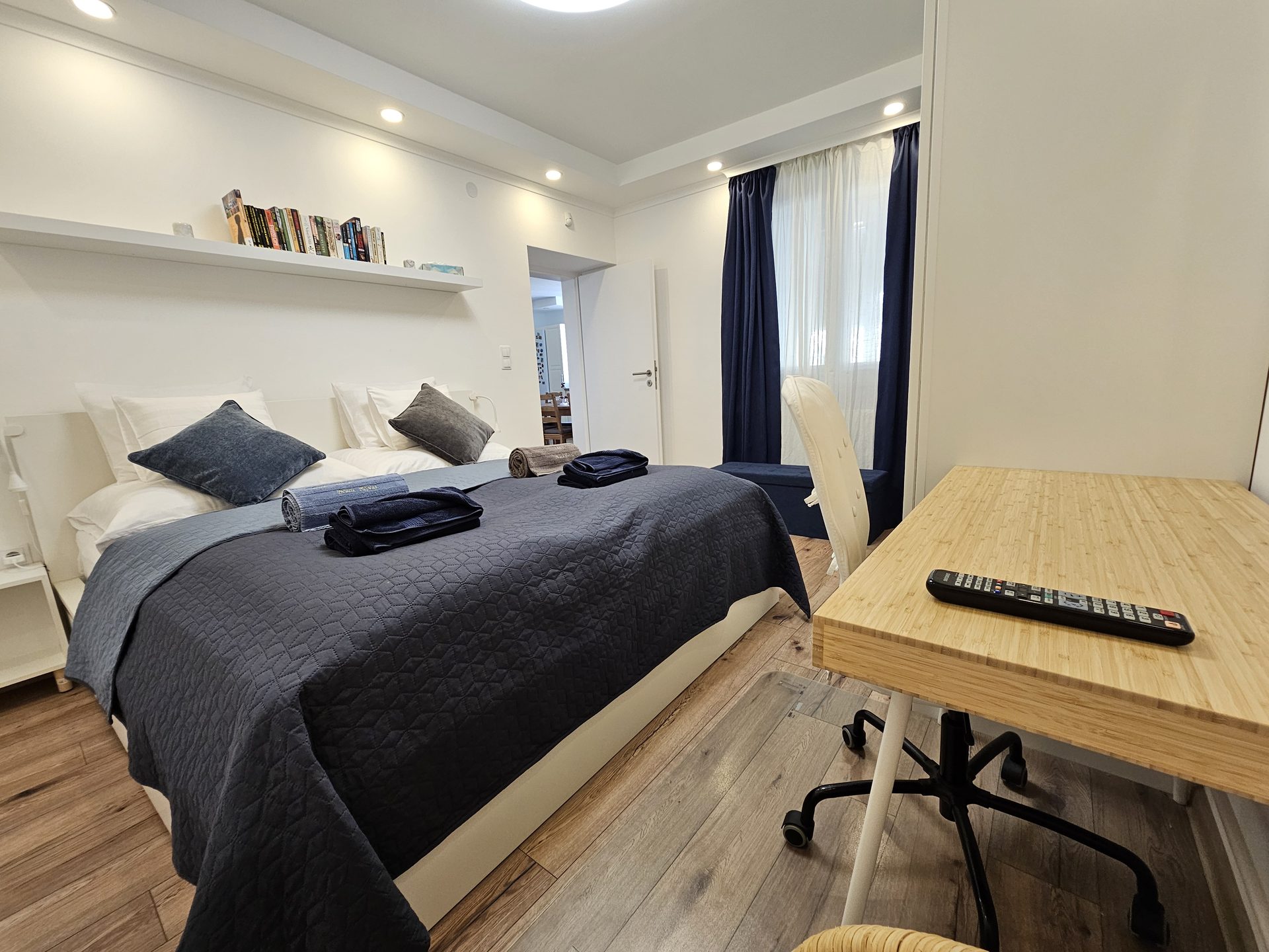 Bedroom three with television
