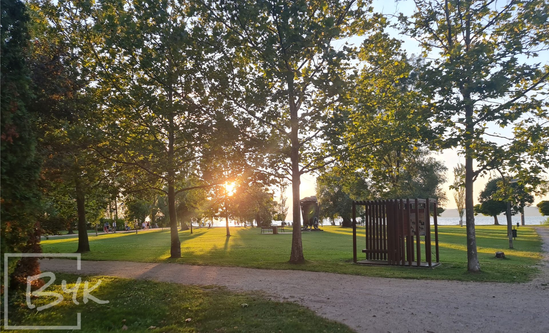 Lakeside park at sunset